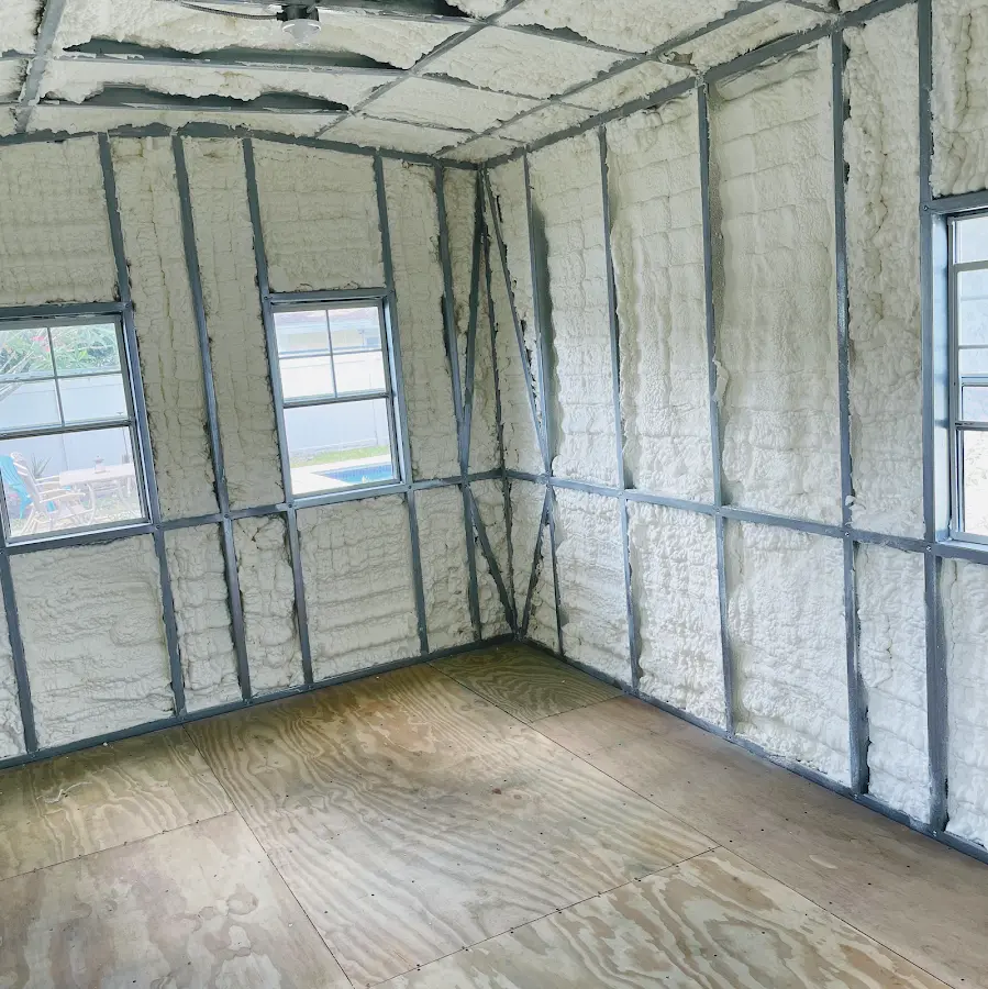 Closed-cell spray foam insulation applied to wall cavities in a residential project in Magnolia